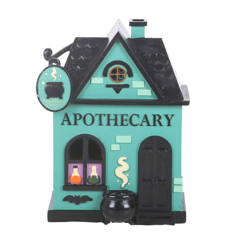 Model of a teal apothecary building with black accents on a white background