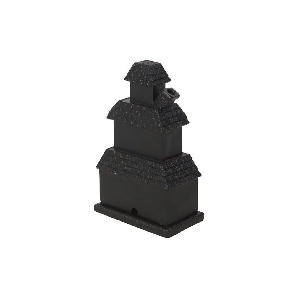 Black three-tiered decorative object on a white background