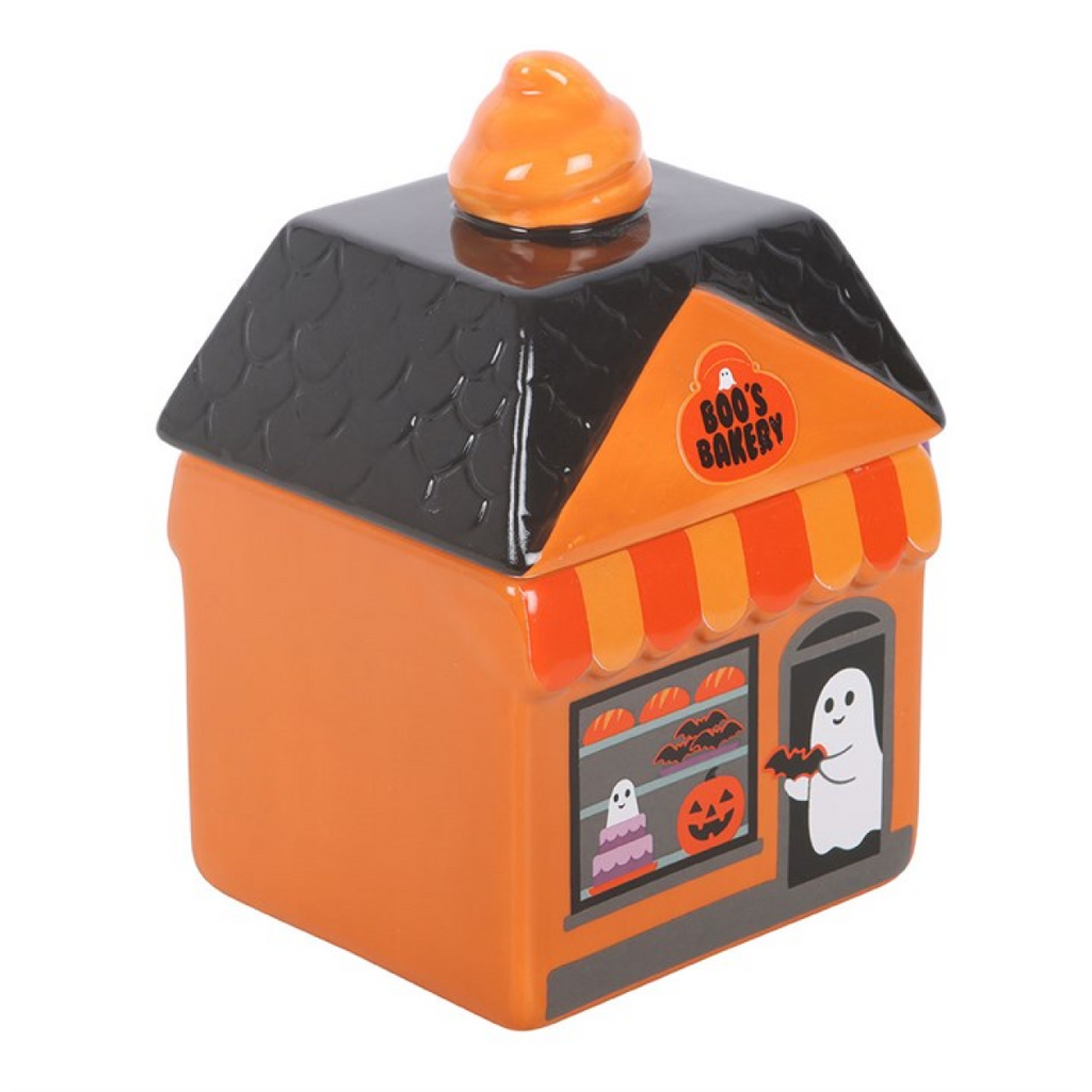Halloween-themed cookie jar with orange and black design on a white background