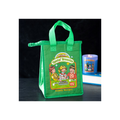 Green tote bag with cartoon characters and text on a dark surface