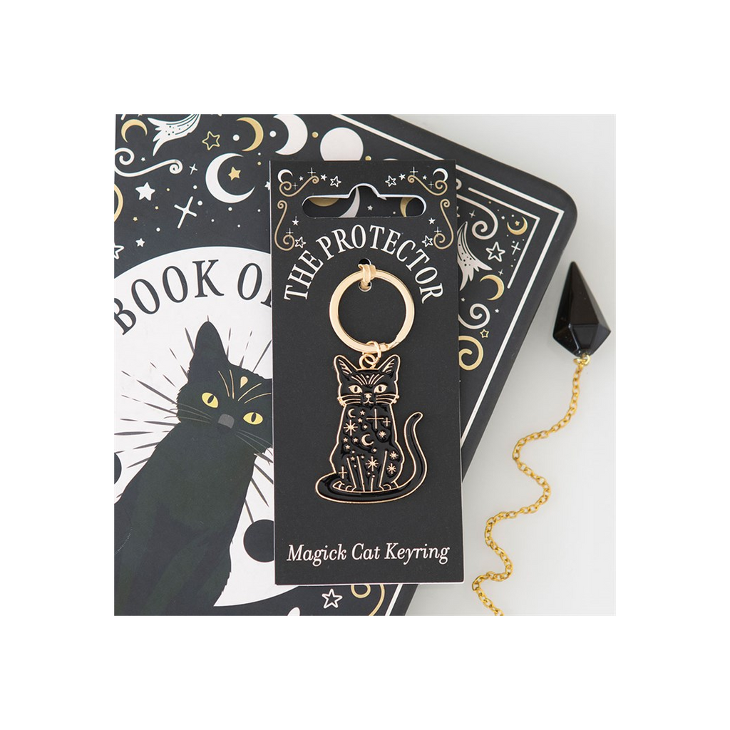 Magick cat keyring packaging with black cat illustration on a white background