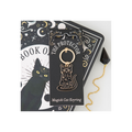 Magick cat keyring packaging with black cat illustration on a white background