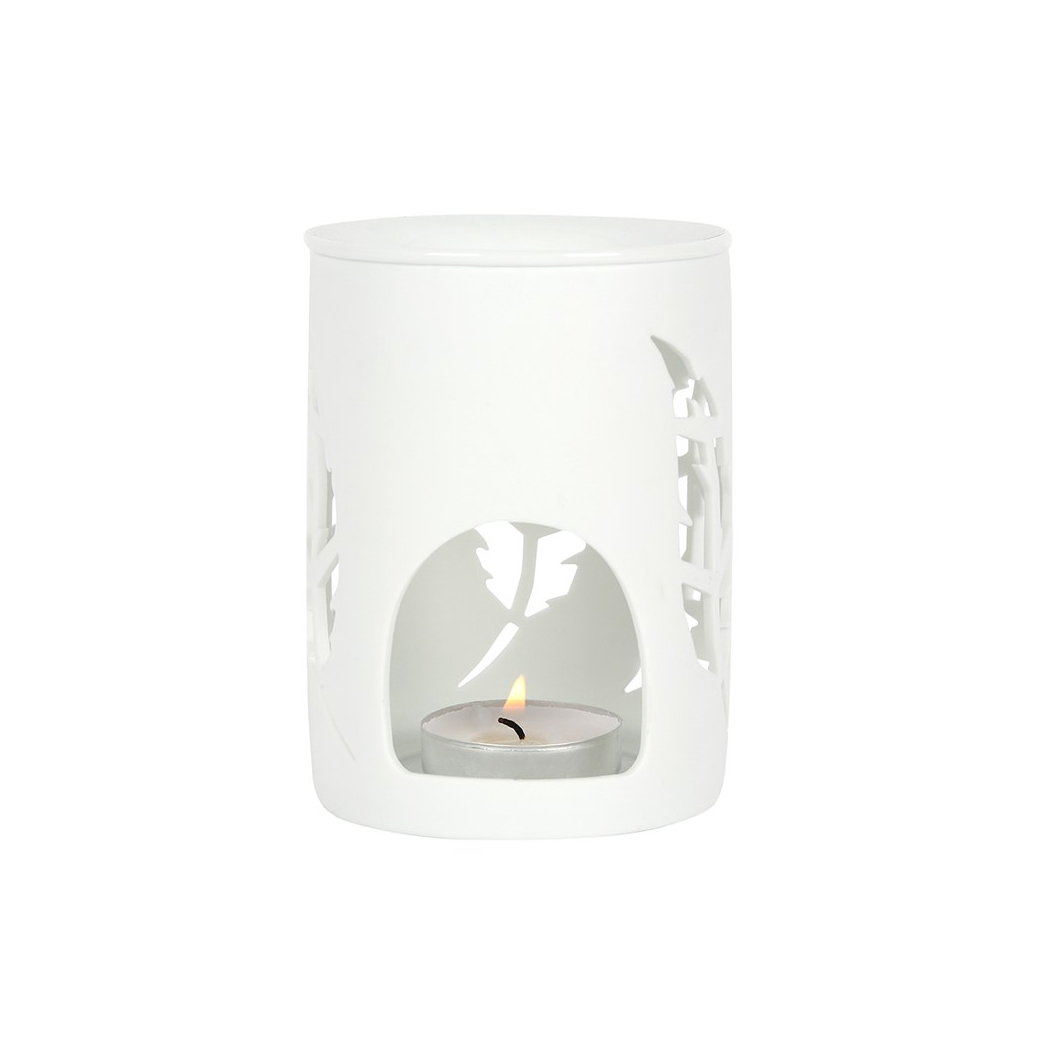 White candle holder with cut-out design on a white background