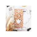 Spooky season enamel keyring with packaging on a white background