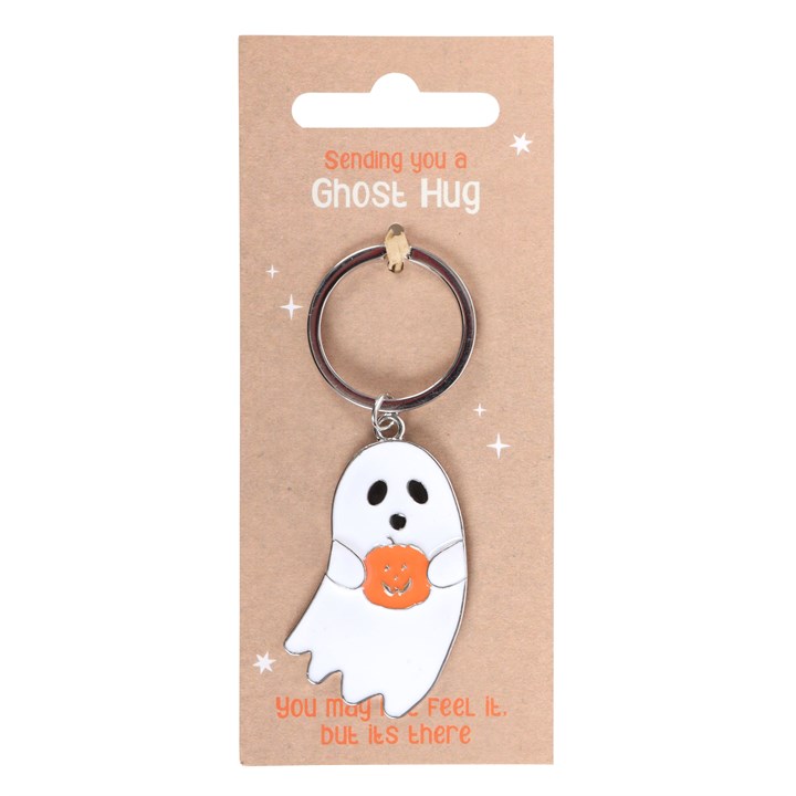 Ghost-shaped keychain with a pumpkin on a brown card with text