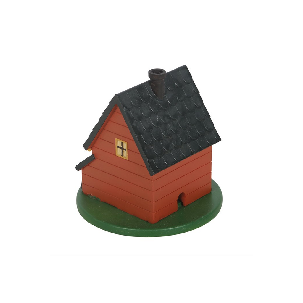 Model of a small red cabin with a gray roof on a white background