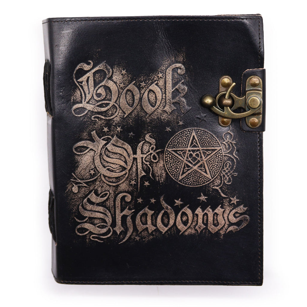 Black leather-bound book with 'Book of Shadows' text and pentacle symbol on a white background