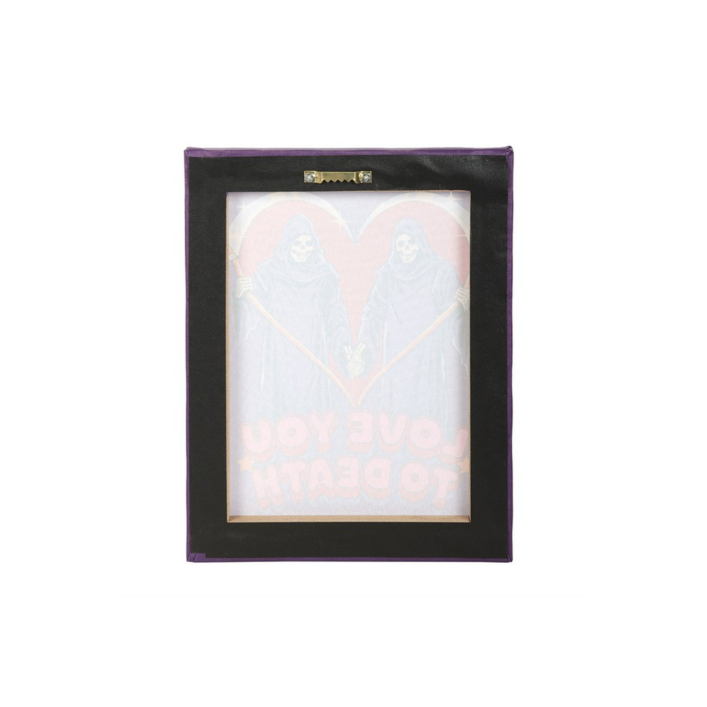 Heart-shaped object in a black frame on a white background