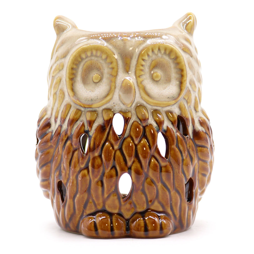 Ceramic owl-shaped candle holder with brown and beige pattern on a white background