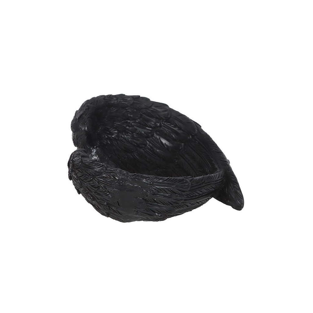 Black bird-shaped object on a white background