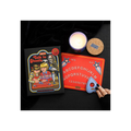Halloween-themed board game with a candle and coaster on a dark surface
