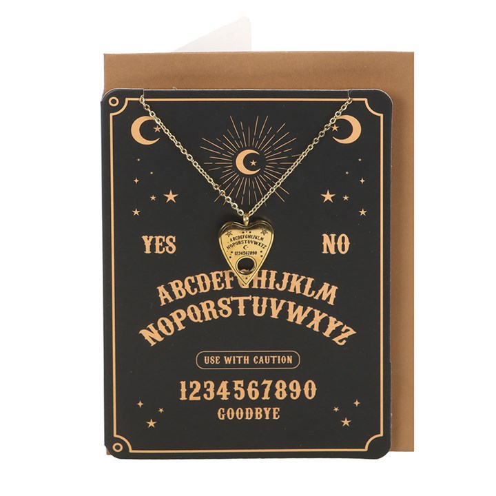 Necklace with Ouija board design on a black card with gold text.