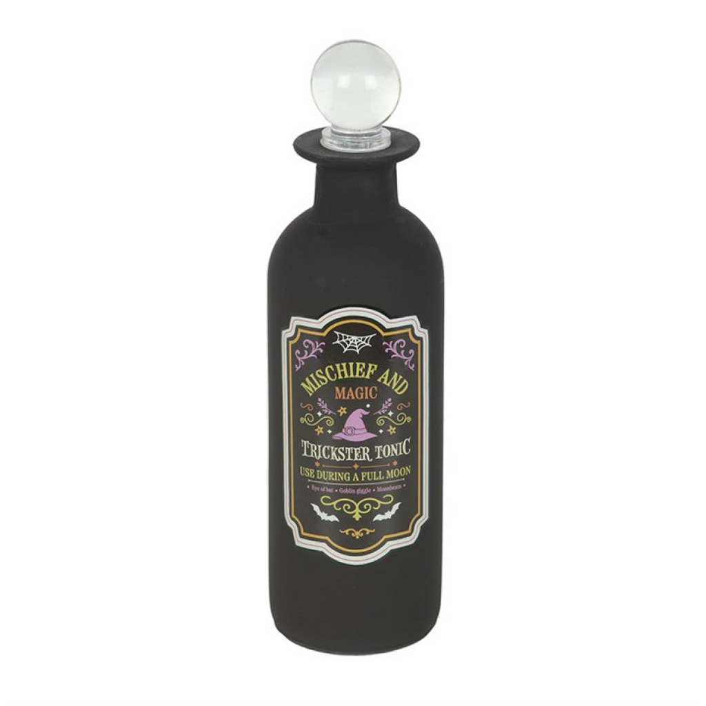 Black bottle with a decorative label on a white background