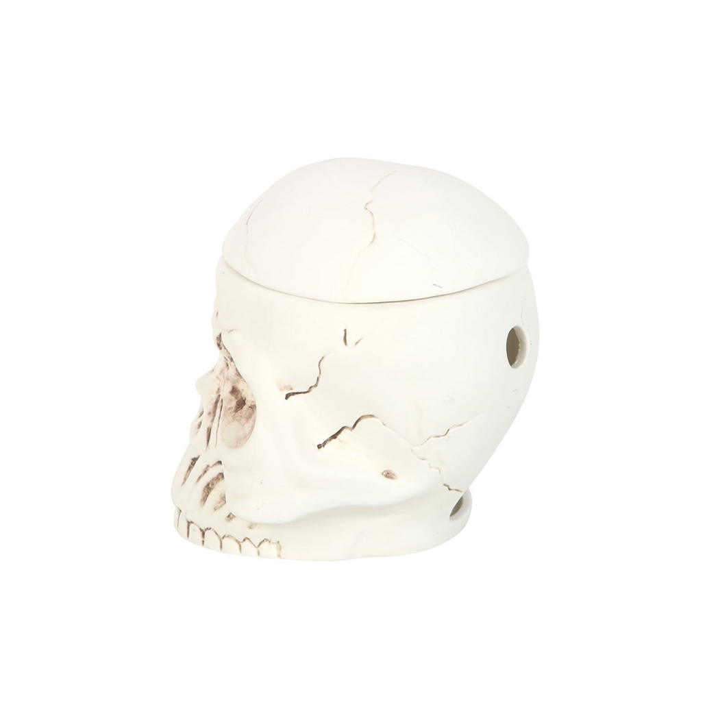 Skull-shaped container with marble texture on a white background