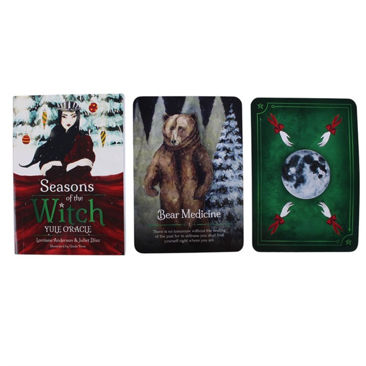 Three cards from 'Seasons of the Witch Yule Oracle' with illustrations of a witch, bear, and moon.