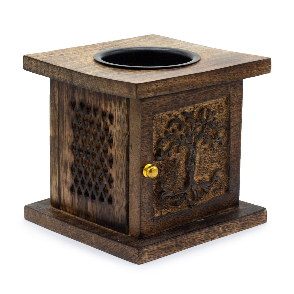 Wooden square wax melter with decorative design on a white background