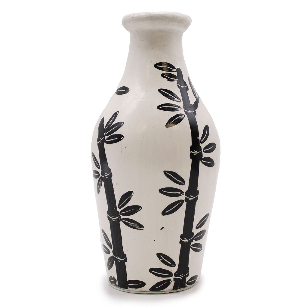 White vase with black bamboo pattern on a white background